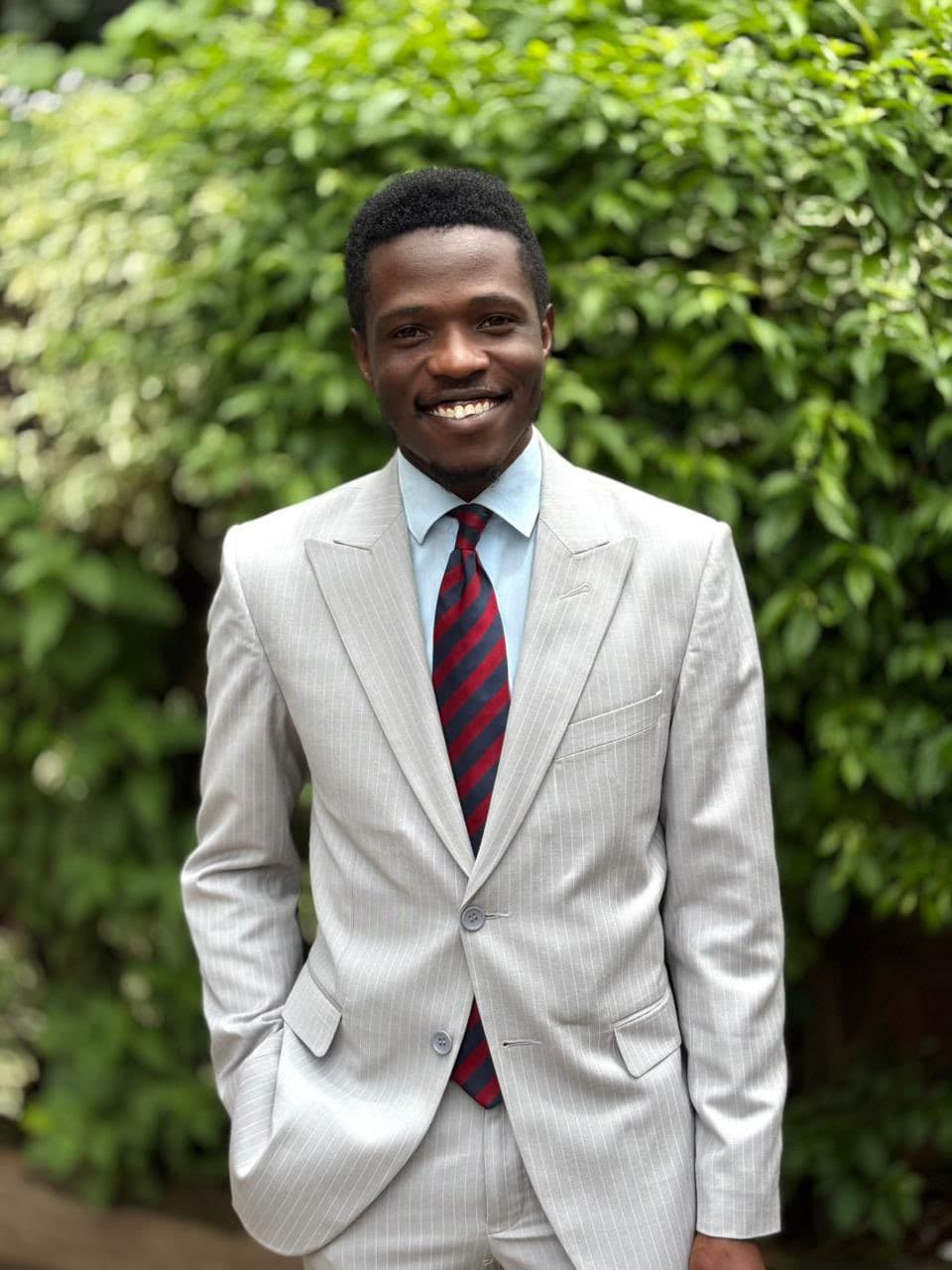 Dulo Attires grey pinstripe bespoke suit